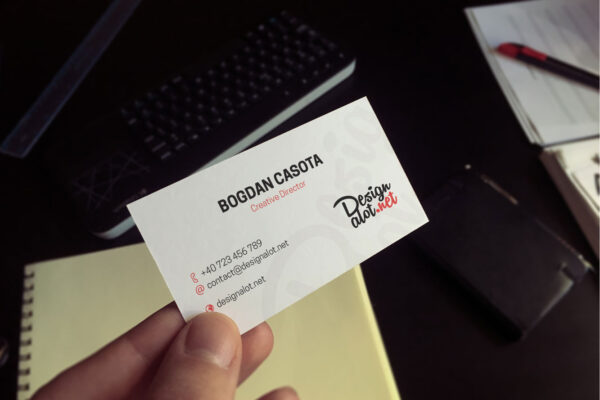 in-hand-above-office-business-card-mockup